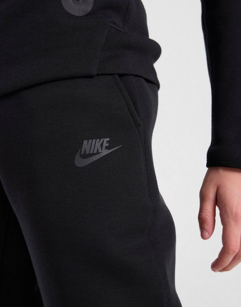 Nike tech fleece pants junior black hotsell