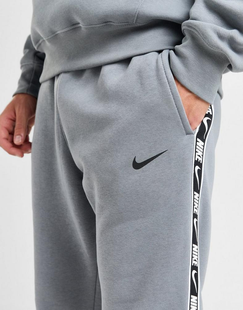 Grey nike tape joggers sale